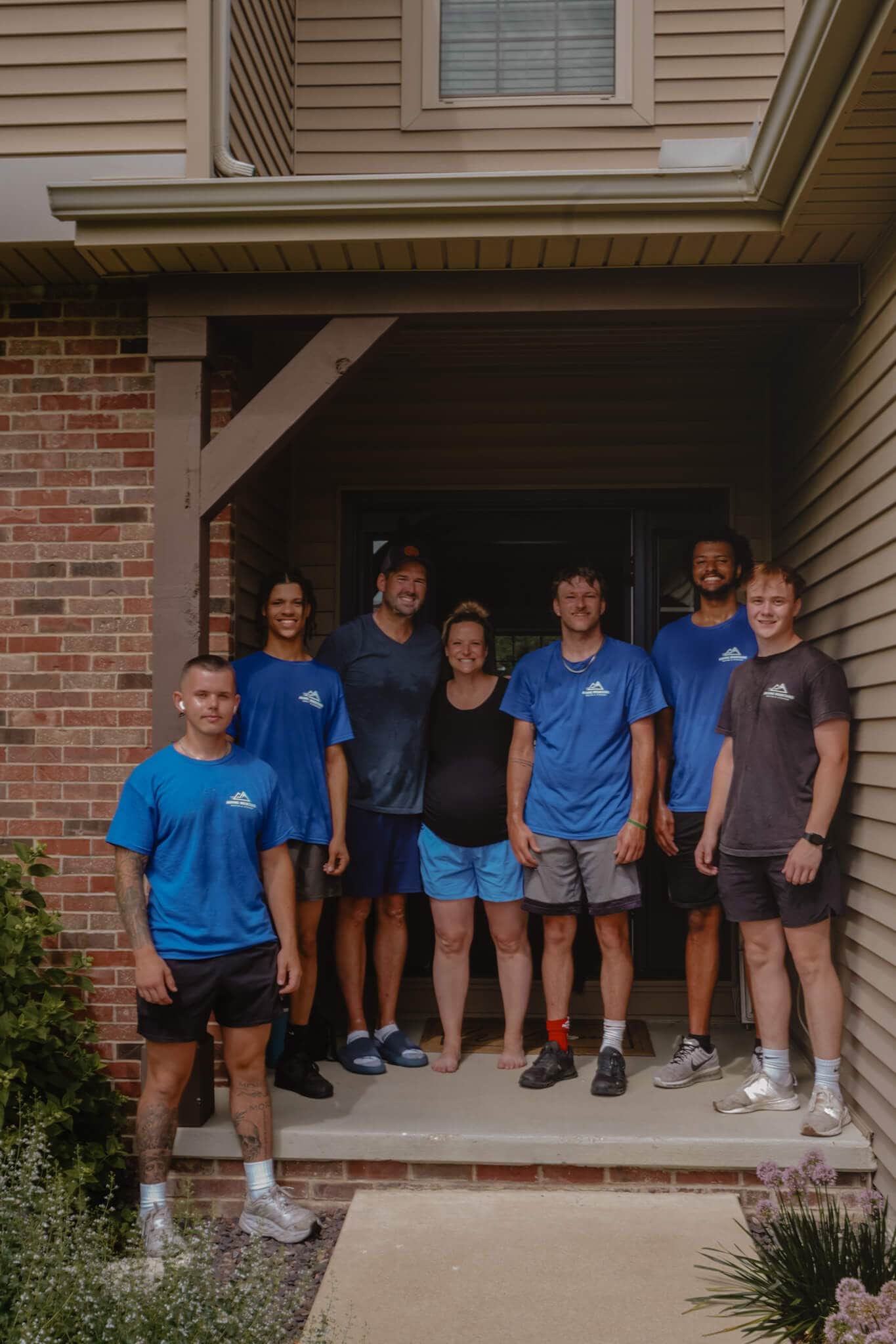 Professional movers helping a young expecting family with their local move in bloomington